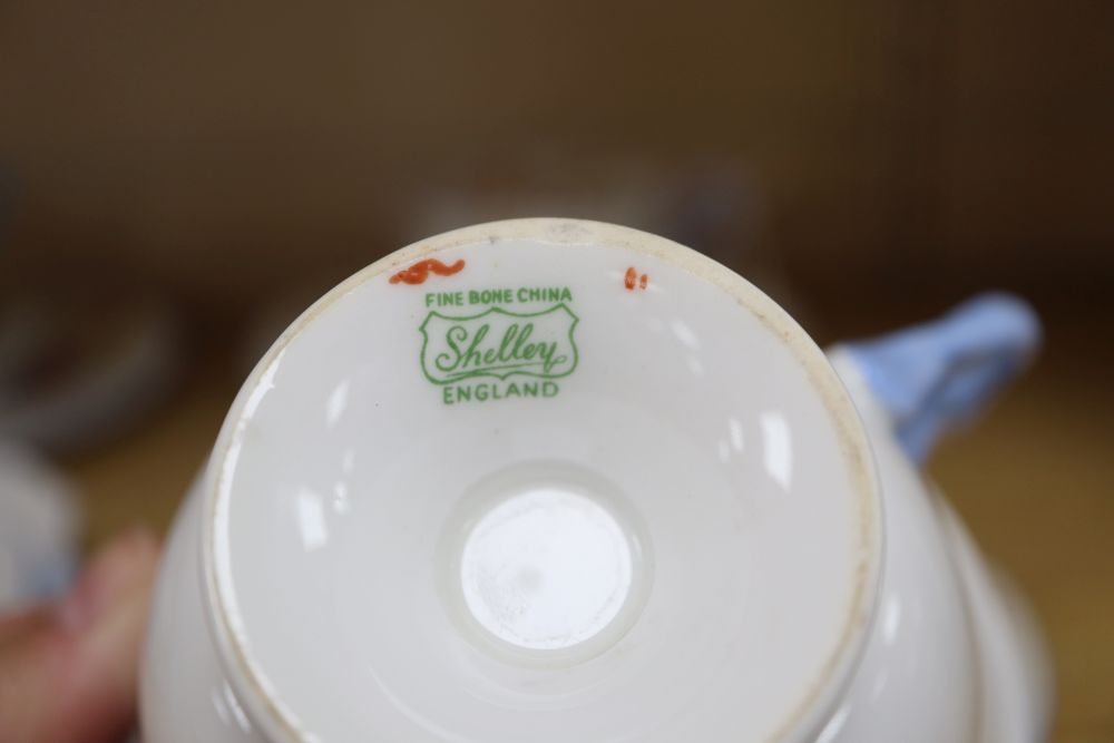 A Shelley part teaset comprising six cups, saucers and plates including a cake plate